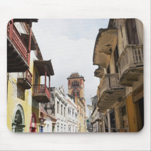 Low angle view of apartments along the street mouse pad