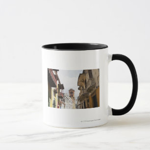 Low angle view of apartments along the street mug