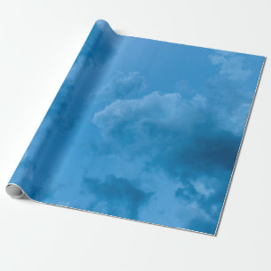 Low angle view of blue clouds wrapping paper