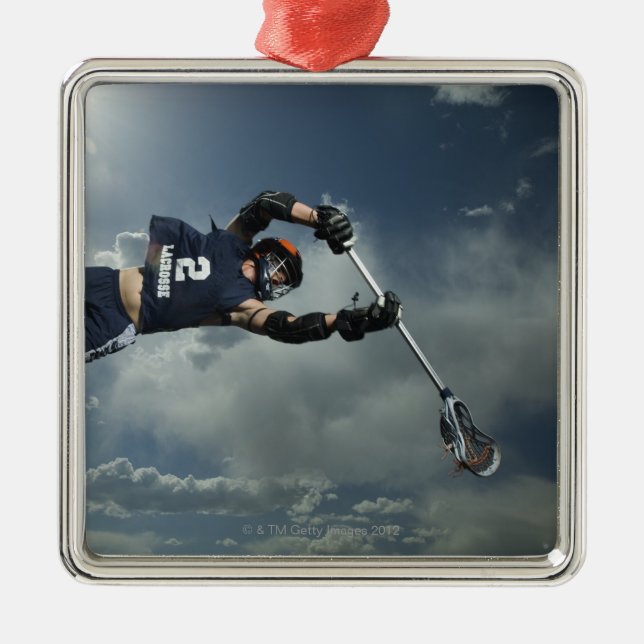 Low angle view of jai-alai player jumping metal ornament (Front)