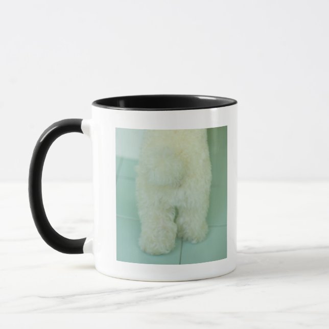 Low section view of a miniature poodle mug (Left)