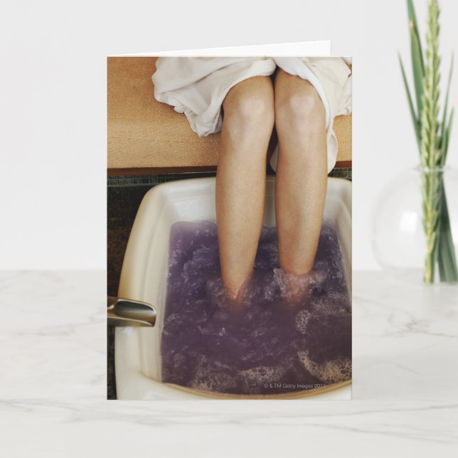 Low section view of a woman getting a pedicure card (Front)