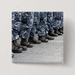 Low section view of sailors 15 cm square badge