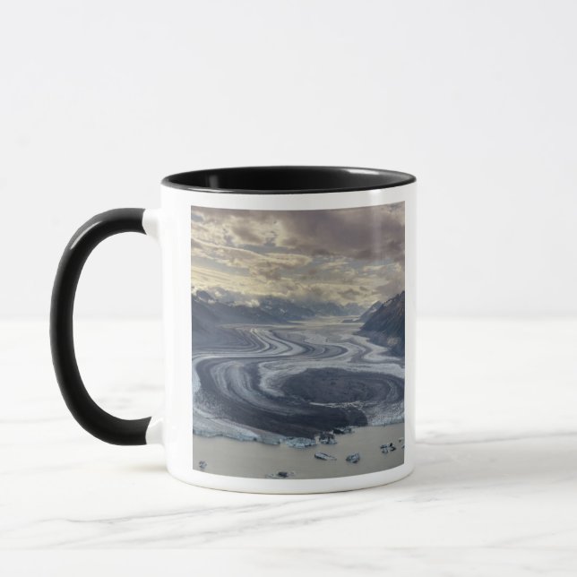 Lowell Glacier flows into the Alsek River in Mug (Left)