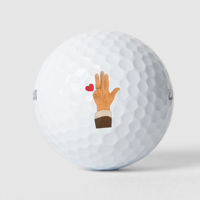 Lula's left hand and a heart golf balls (Front)