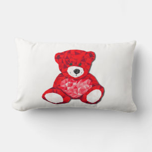 Lumbar pillow with red teddy bear in white.