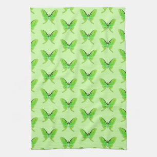Luna moth on a pale green background tea towel
