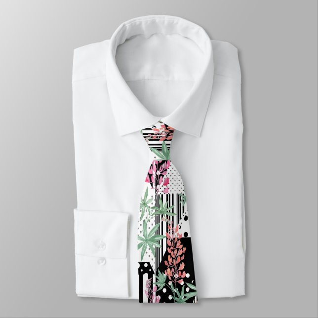 Lupines on a patchwork black and white background  tie (Tied)