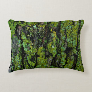 Lush, green, and mossy tree trunk decorative cushion
