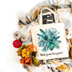 Lush green tropical leaves tote bag