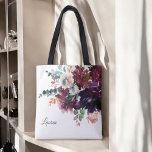Luxurious Watercolor Burgundy Floral with Name Tote Bag<br><div class="desc">A great gift idea for bridesmaids or other members of your wedding party,  this design features a luxurious watercolor bouquet of dark florals in burgundy,  eggplant purple,  deep rose,  pink,  beige,  teal and green. A text template is included for you to personalise with a name.</div>