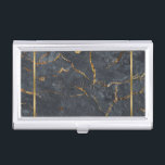 Luxury black and gold marble texture business card holder<br><div class="desc">Image of luxury black and gold marble texture with gold stripe accent. Customisable monogram,  embossed look.</div>