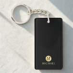 Luxury Black and Gold Personalised Monogram Key Ring<br><div class="desc">Luxury Black and Gold Design featuring black monogram in gold circle element with name in gold professional font style on black background. Perfect as father's day gifts for dad, gifts for grandfather, husband, groomsman and more. Please Note : The foil details are simulated in the artwork. No actual foil will...</div>
