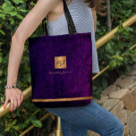 Luxury elegant gold modern purple monogrammed tote bag<br><div class="desc">Classy exclusive looking office or personal monogrammed tote bag featuring a faux copper metallic gold glitter square with your monogram name initials and a sparkling stripe over a stylish purple faux leather look background. Suitable for small business, corporate or independent business professionals, personal branding or stylists specialists, makeup artists or...</div>