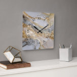 Luxury Gold & White Flowing Marble Square Wall Clock<br><div class="desc">A luxurious gold and white marble background with metallic veins and soft flowing gradients. The elegant shimmer and fluid stone design make this texture perfect for modern home decor.</div>