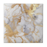 Luxury style white and gold marble effect ceramic tile<br><div class="desc">You can add a touch of luxury to your home with these white and gold marble effect ceramic tiles. The intricate veining detail and elegant colour palette, enhanced with splashes of gold, create a sophisticated and timeless seamless design. This makes them perfect for any modern home and ideal for adding...</div>