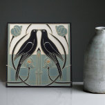 Mackintosh Black Birds Art Deco Nouveau Wall Decor Ceramic Tile<br><div class="desc">This ceramic tile features two black birds and intricate floral patterns reminiscent of the iconic style of Mackintosh. He was a prominent Scottish architect, designer, and artist of the Art Nouveau movement. Clean lines, geometric shapes, and a strong sense of symmetry characterise his work. These elements are beautifully represented in...</div>