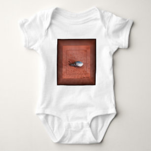 Macro Photograph of Snail on Terracotta Baby Bodysuit