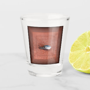 Macro Photograph of Snail on Terracotta Shot Glass
