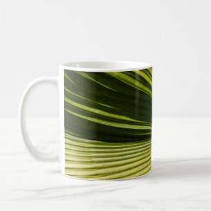 Macro photography of green leaf coffee mug