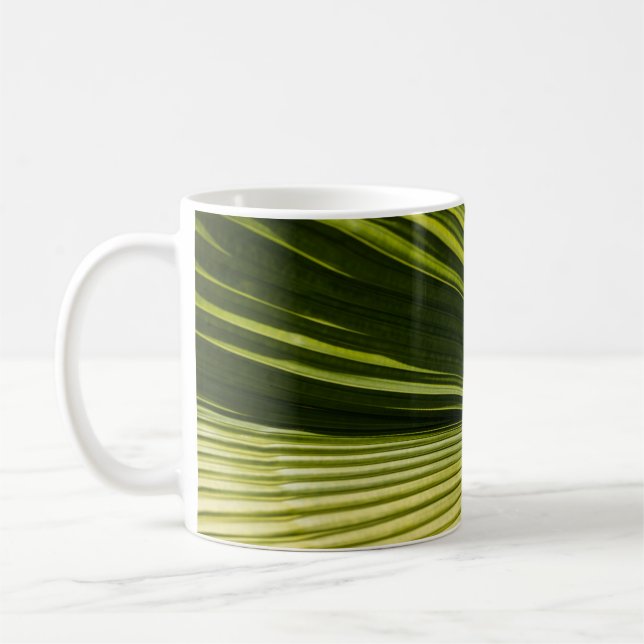 Macro photography of green leaf coffee mug (Left)