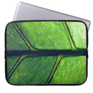 Macro photography of green leaf laptop sleeve