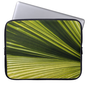 Macro photography of green leaf laptop sleeve