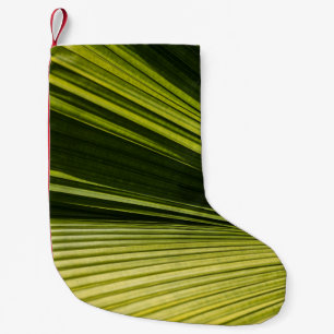 Macro photography of green leaf small christmas stocking
