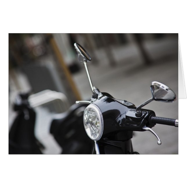 Madrid, black Vespa scooter (Front Horizontal)