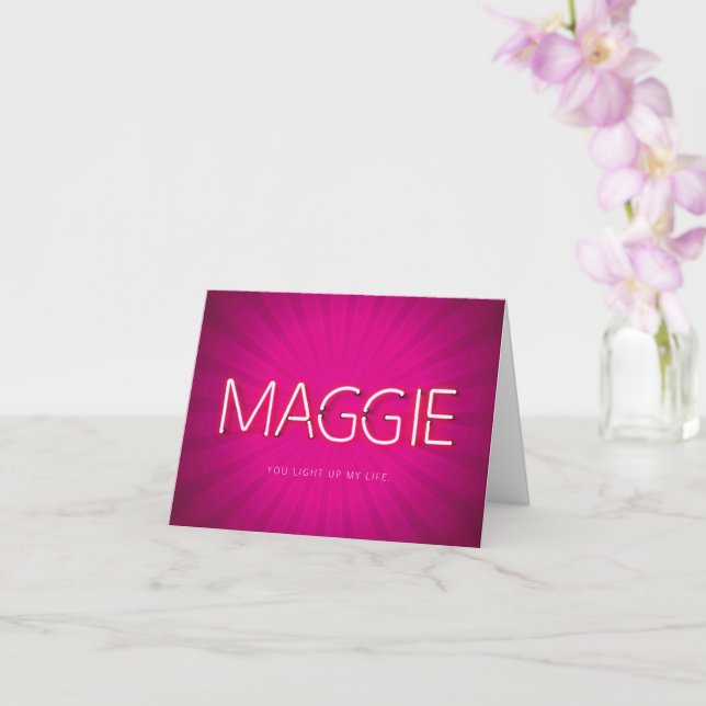 Maggie name in glowing neon lights card (Orchid)