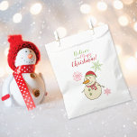 Magic of Christmas Snowman Favour Bag<br><div class="desc">A favour bag designed for Christmas treats,  featuring an adorable snowman adorned with a red Santa hat and carrot nose,  surrounded by snowflakes,  and bearing the phrase - Believe in the Magic of Christmas!</div>