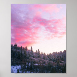 Magical bright pink sunset above snowy forest poster