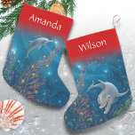 Magical Dolphin Unique Beach Themed Name Small Christmas Stocking<br><div class="desc">Dive into the holiday spirit this year with enchanting dolphin christmas stockings, designed with original watercolor art by Raphaela Wilson that captures the whimsical spirit of these elegant porpoises. Each custom stocking is a canvas of beach holiday joy, depicting vibrant colours and a playful scene of dolphins decorating under the...</div>