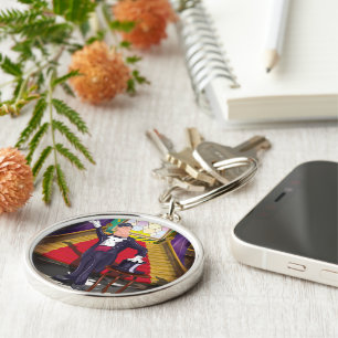 Magician performing magic trick on stage key ring