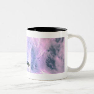 Magnified look at a sperm fertilising an egg Two-Tone coffee mug