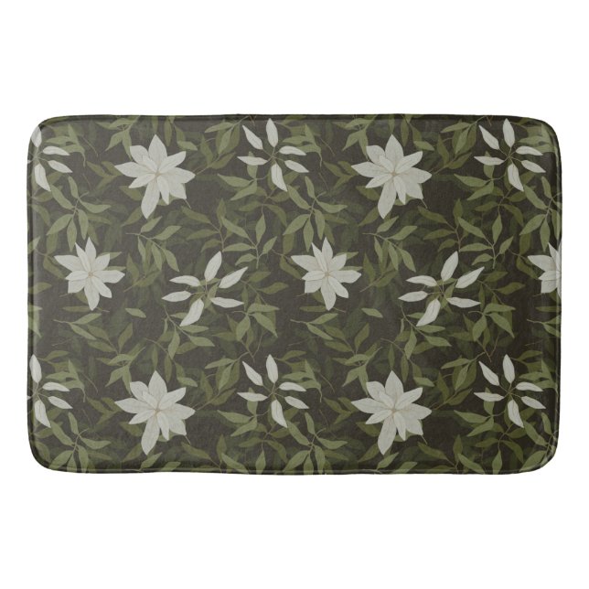 Magnolia and green leaves on black bath mat (Front)