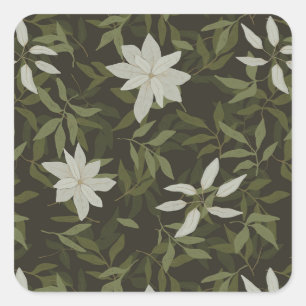 Magnolia and green leaves on black square sticker
