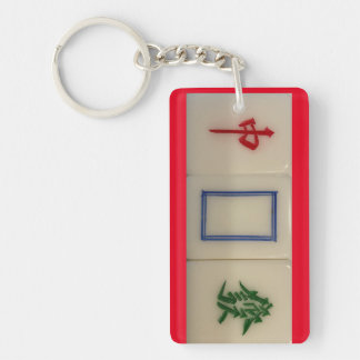 Mahjong keychain with dragon symbols