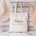 Maid of Honour Modern Minimalist Script Tote Bag<br><div class="desc">Elevate your bachelorette party with our "Bridesmaid Modern Minimalist Script" collection. This exquisite line of products embodies contemporary elegance and timeless style, perfect for celebrating your upcoming nuptials in a modern and sophisticated way. Our minimalist script design places your bridesmaids at the forefront, adding a touch of class to every...</div>