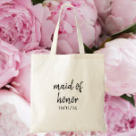 Maid of Honour / Personalised Bridal Party Gift Tote Bag<br><div class="desc">Celebrate your right-hand girl with this chic “Maid of Honour” tote bag featuring elegant black script on the front with your wedding date below. The back is personalised with the maid of honour’s name, creating a thoughtful and stylish keepsake she’ll love long after the big day. Simple, modern, and timeless,...</div>