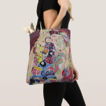 Maiden (Virgin), Gustav Klimt, Vintage Art Nouveau Tote Bag<br><div class="desc">Beautiful all-over-print tote bags! Available in two styles and two sizes! The Maiden (aka The Virgin) (1913) by Gustav Klimt is a vintage Victorian Era Art Nouveau fine art symbolism portrait painting. Several women yawning, stretching and sleeping in a bed covered with colourful mosaic pattern blankets. About the artist: Gustav...</div>