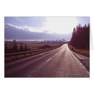 Main road with low winter sun.