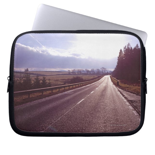 Main road with low winter sun. laptop sleeve (Front)