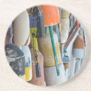 Maine, Bar Harbour. Colourful lobster trap buoys Coaster