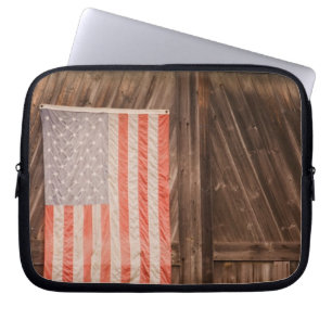 Maine, Faded American flag on door of old barn Laptop Sleeve