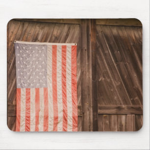 Maine, Faded American flag on door of old barn Mouse Pad