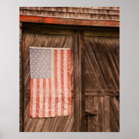 Maine, Faded American flag on door of old barn