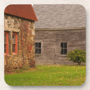 Maine,  Old stone building and wooden barn in Coaster