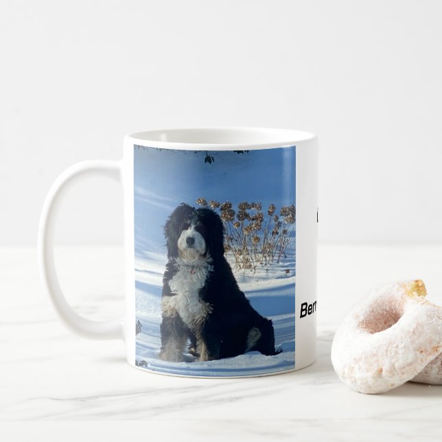Majestic Bernedoodle dog on snow covered hill Mug (With Donut)