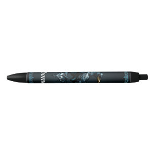 Majestic black raven sitting on an ornate ink pen